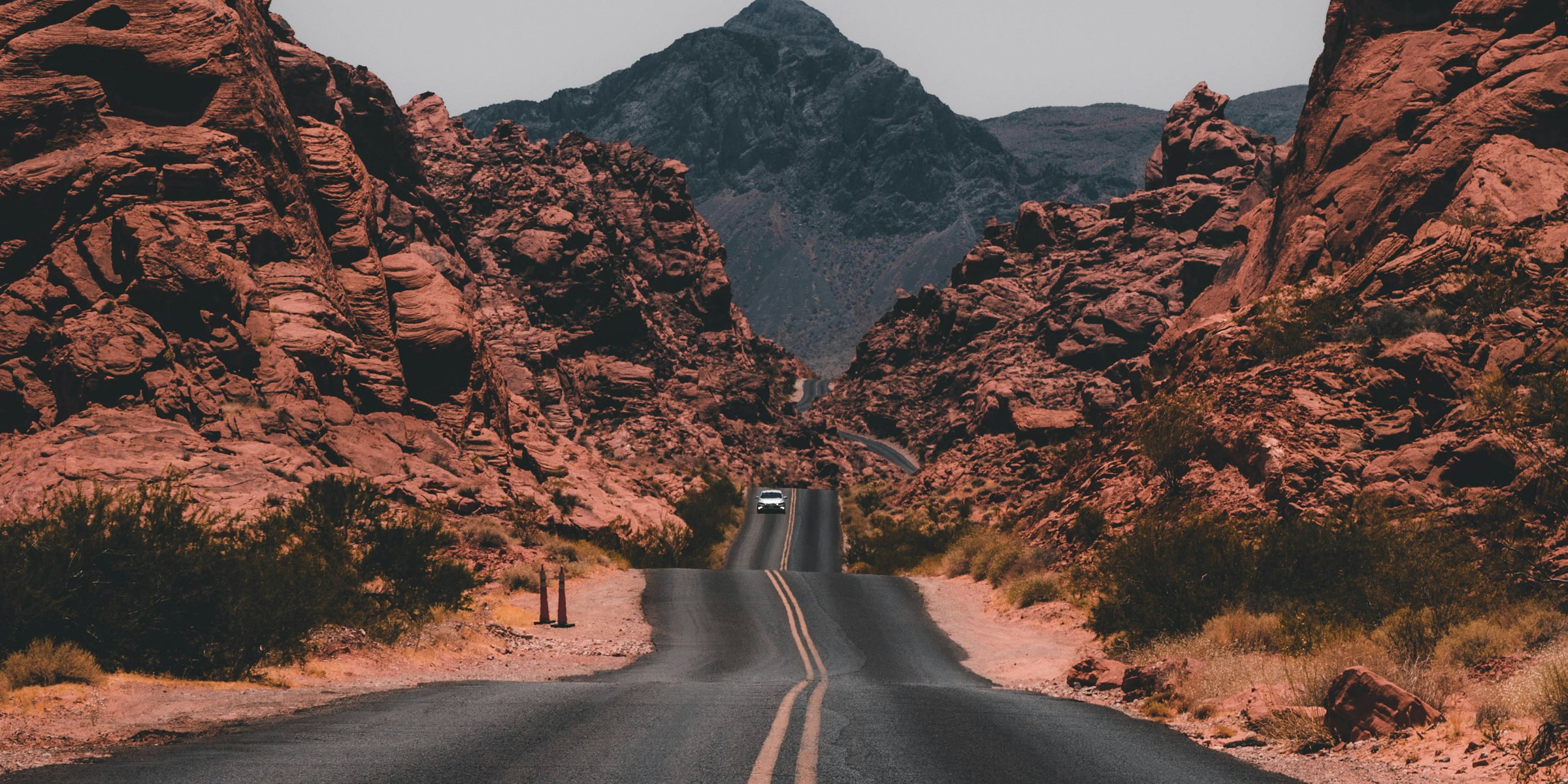 Desert highway winding through red rock country